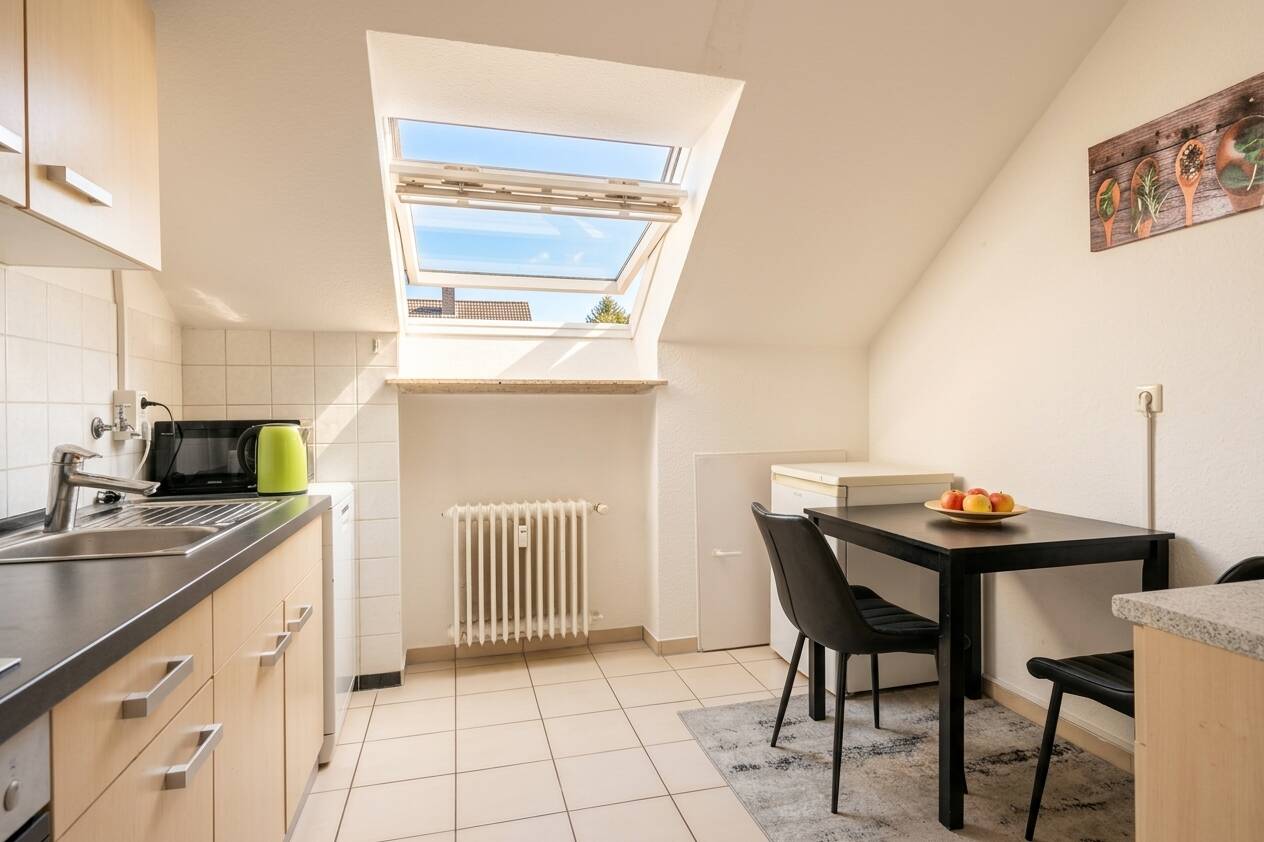 Schicke Dachgeschosswohnung mit Einbauküche in guter Lage von Bielefeld Stieghorst - Foto 2